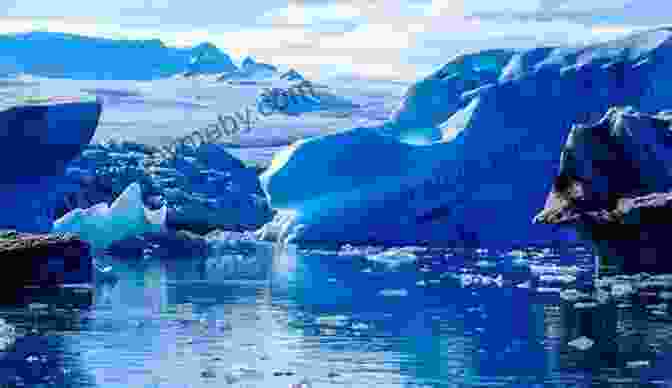 A Breathtaking View Of The Icy Landscape Of The North Pole With Towering Icebergs And Distant Mountains 4th Grade Geography: North And South Poles: Fourth Grade Polar Regions For Kids (Children S Explore Polar Regions Books)