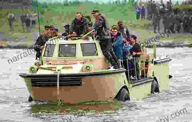 Military Amphibious Vehicle Emerging From The Water With Troops Disembarking On A Beach Military Amphibious Vehicles (Military Machines)